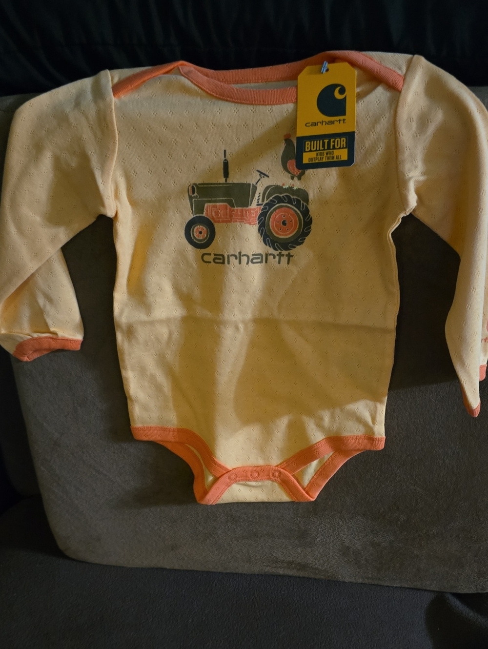 Carhartt Yellow Baby Long Sleeve Bodysuit with Orange Trim & Tractor